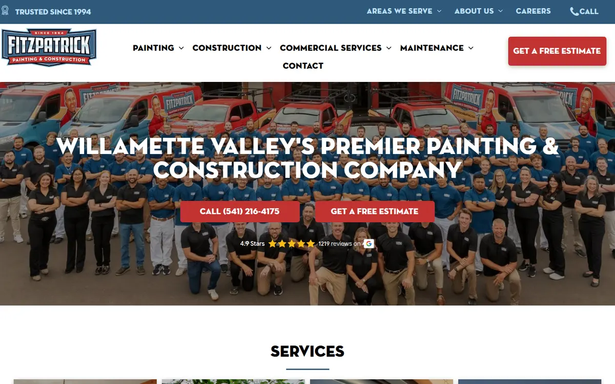 Fitzpatrick Painting home page with the full crew kneeling in front of the company trucks